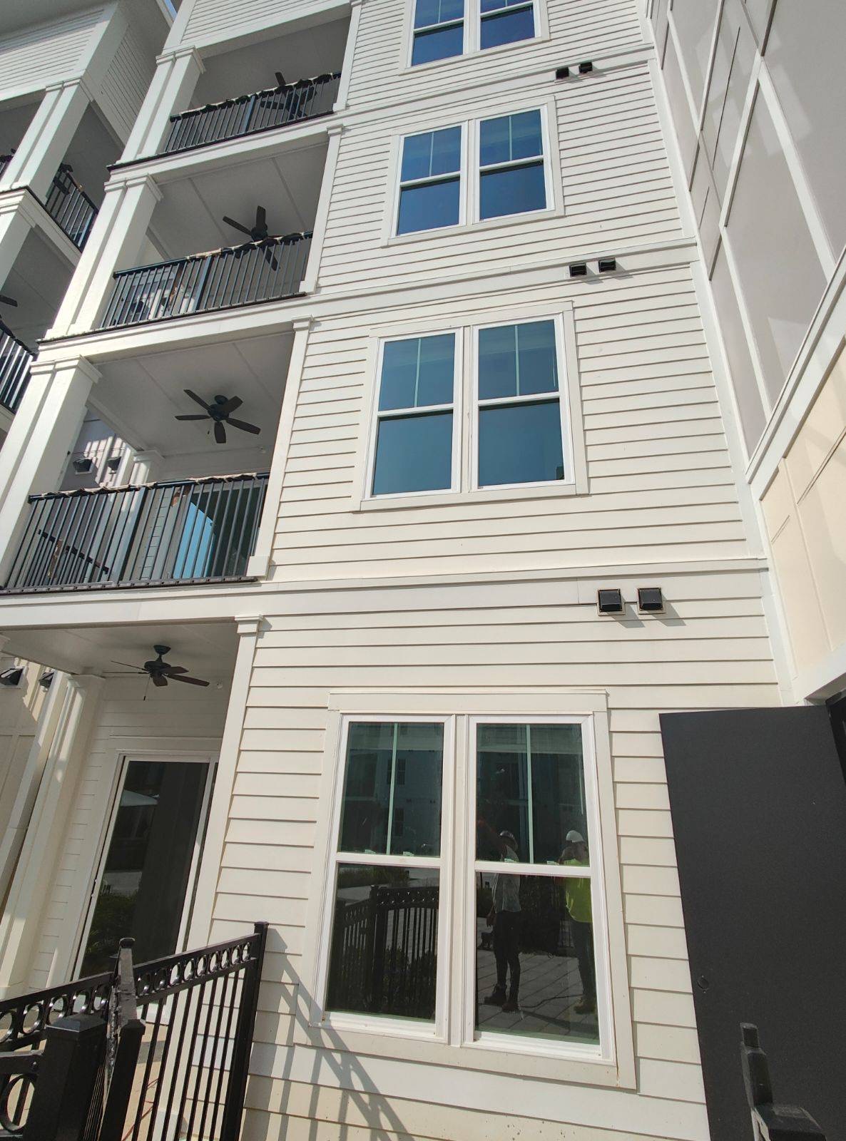 Multifamily exterior with stacked balconies